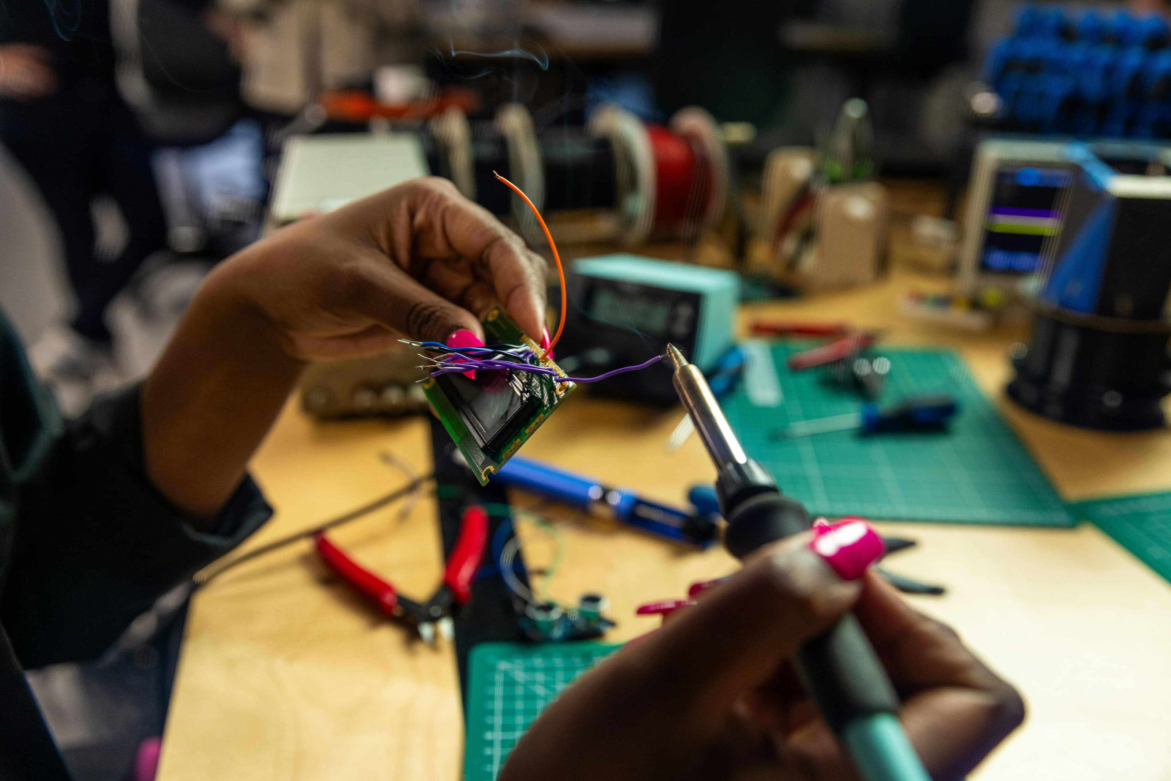 An electrician working on wiring